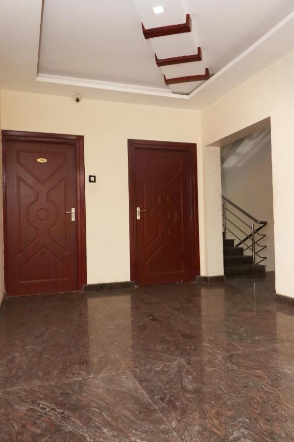 Отель E S Residency Тхени Экстерьер фото